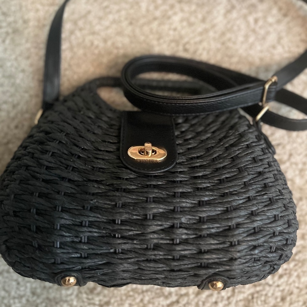 A cute purse pretty big can hold a lot of stuff